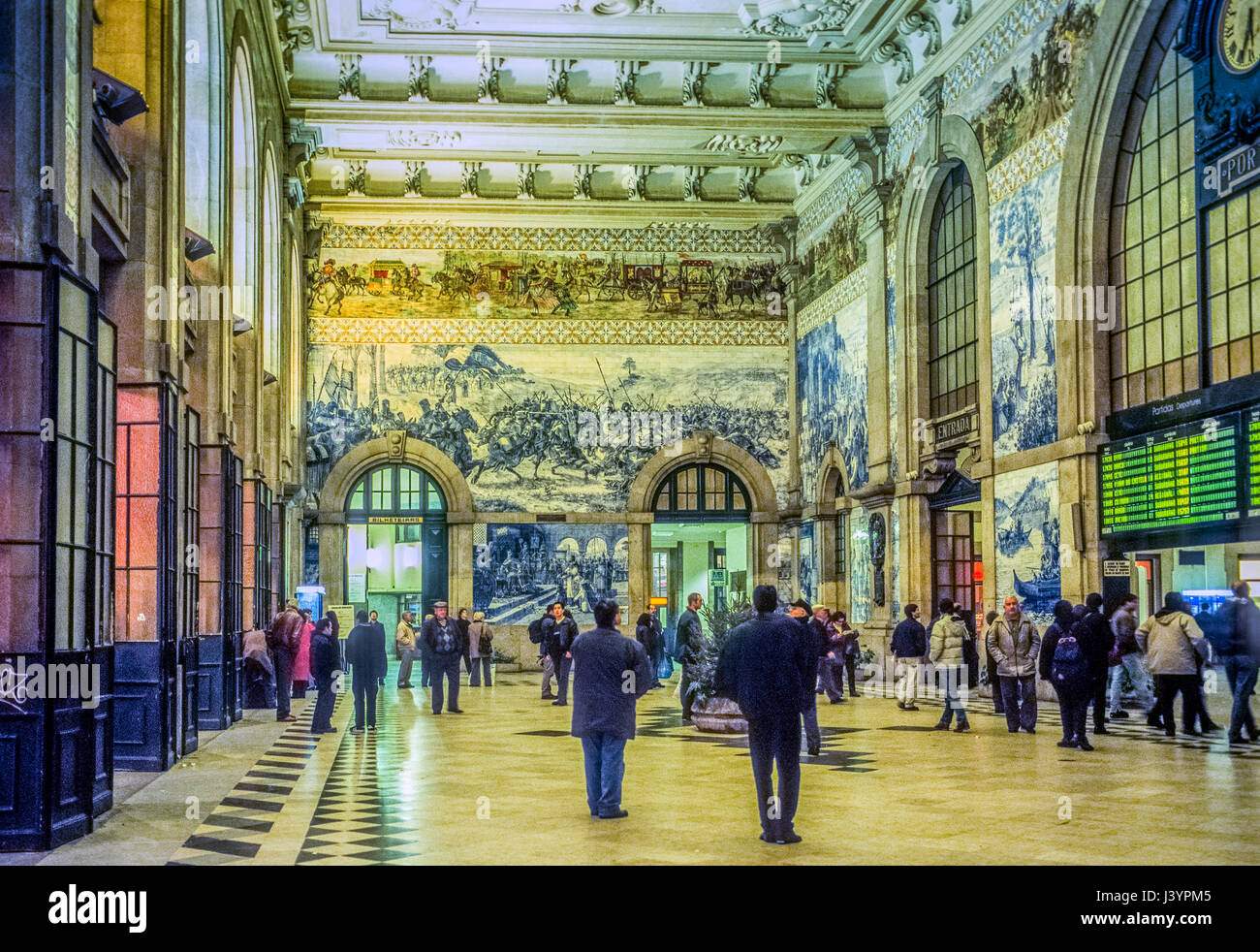 Murals in São Bento train station in Porto, Portugal. The vestibule is framed by pilasters