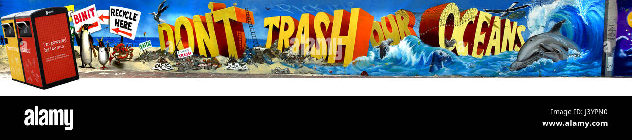 24 inch, (610mm), wide image showing official graffiti on a wall at Bondi Beach with recycling/litter bins added. Please see description Stock Photo