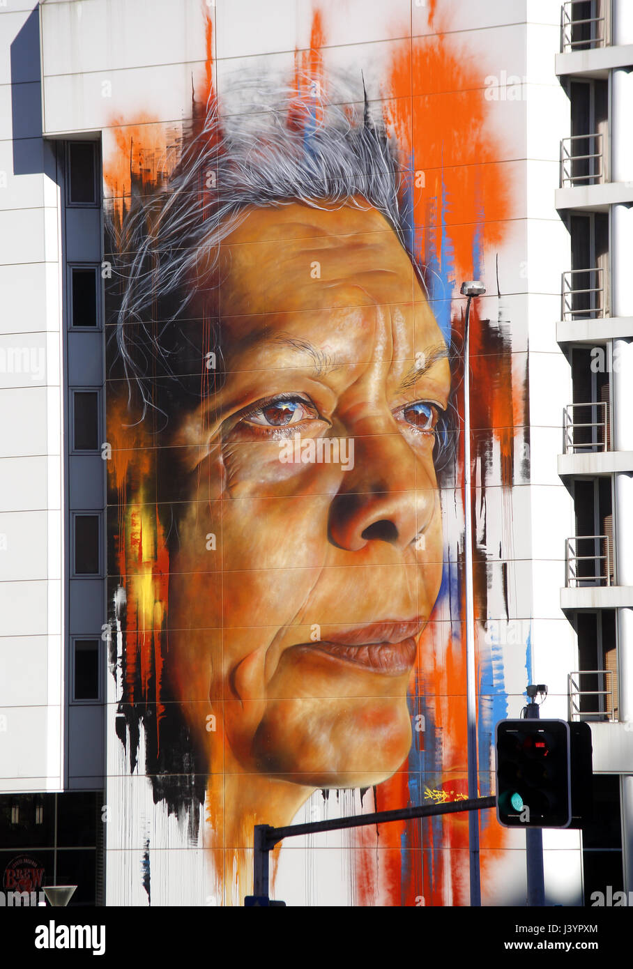 A wall mural of Jenny Monro, an activist for Aboriginal rights; painted by artist Matt Adnate, in Sydney City Business District, Australia. Stock Photo