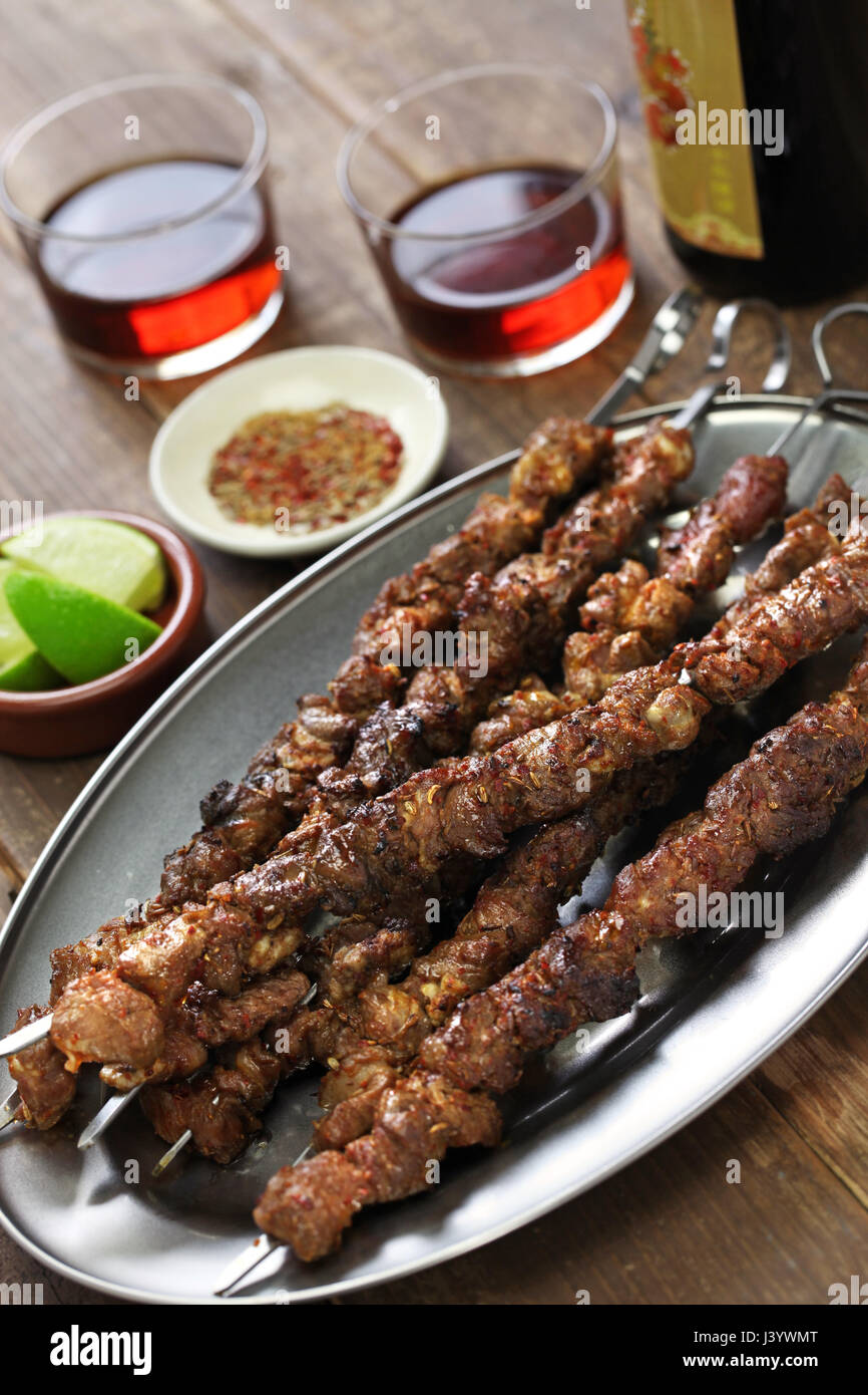 chinese spicy cumin lamb skewers, yang rou chuan Stock Photo - Alamy