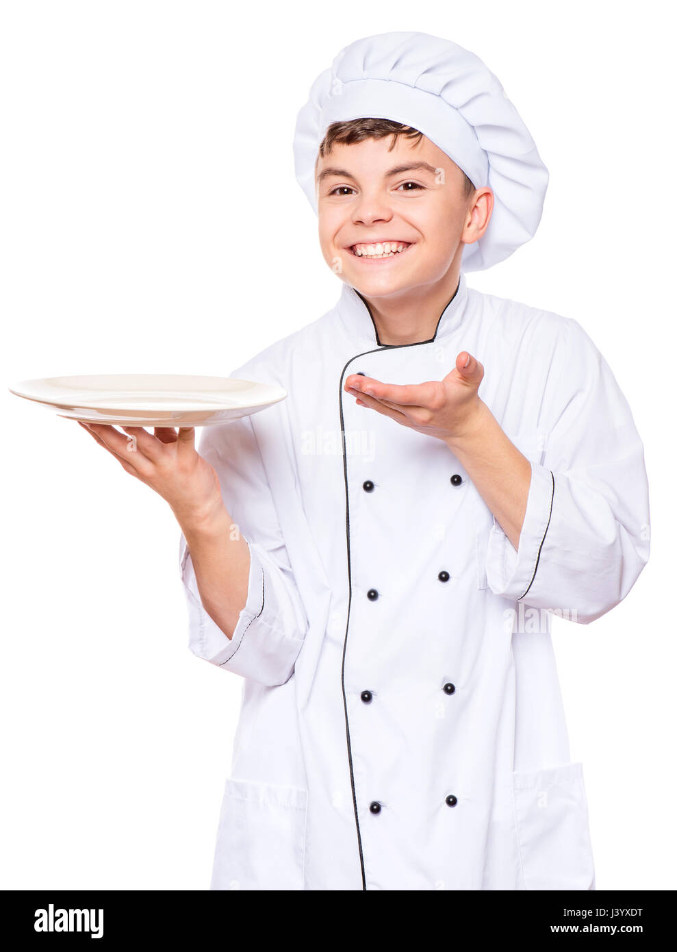Teen boy wearing chef uniform Stock Photo - Alamy