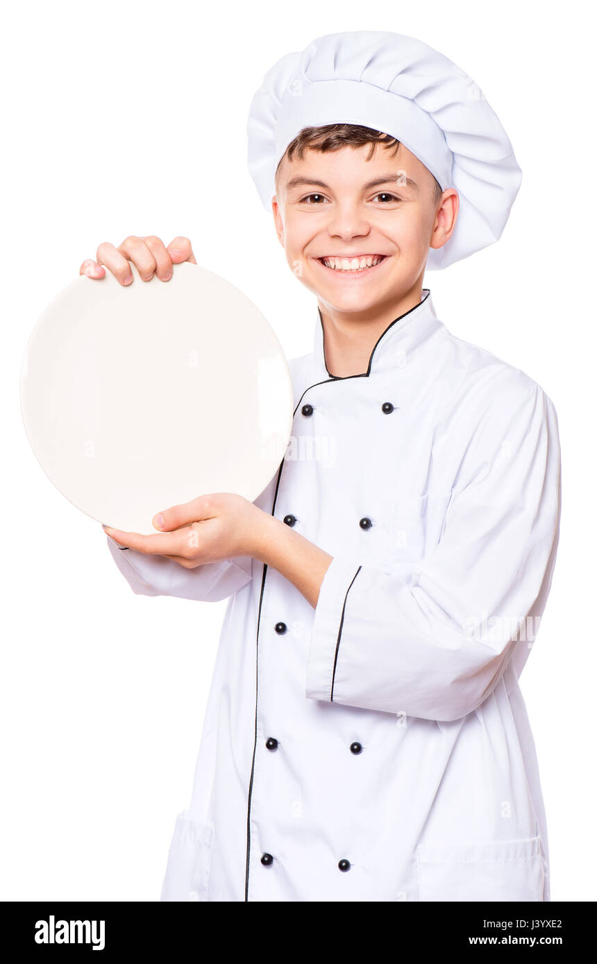 Teen boy wearing chef uniform Stock Photo Alamy