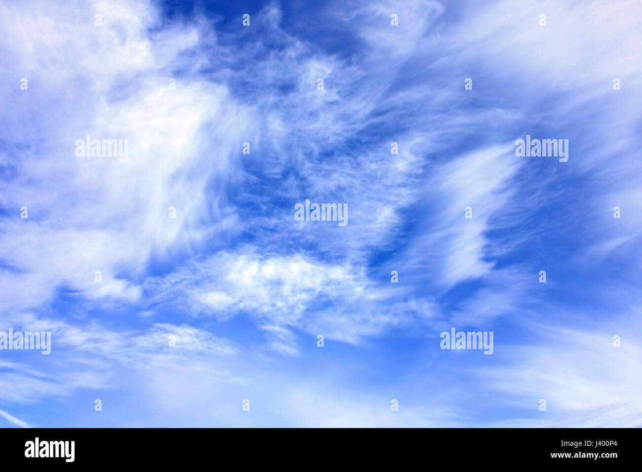 White clouds over blue sky Stock Photo - Alamy