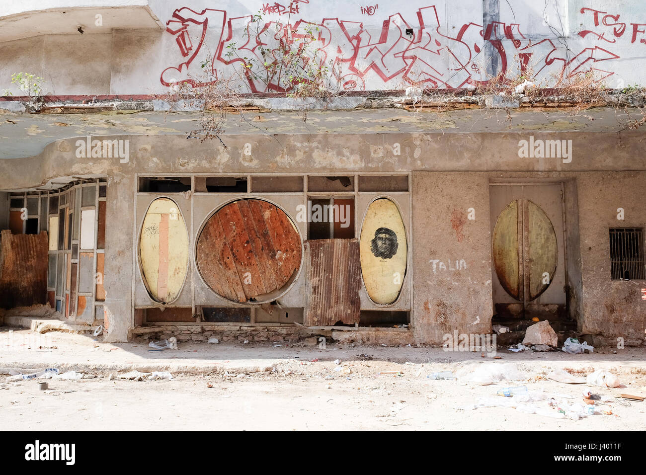 Abandoned building with murals in Havana, Cuba Stock Photo