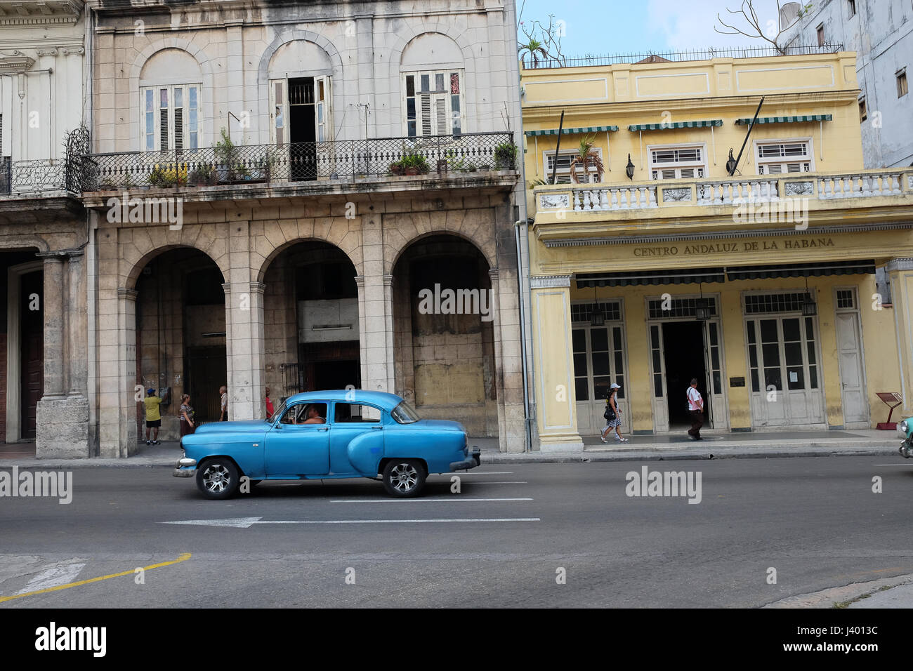 Blue classic car driving on Paseo del Prado, near central park, havana, Cuba. Stock Photo