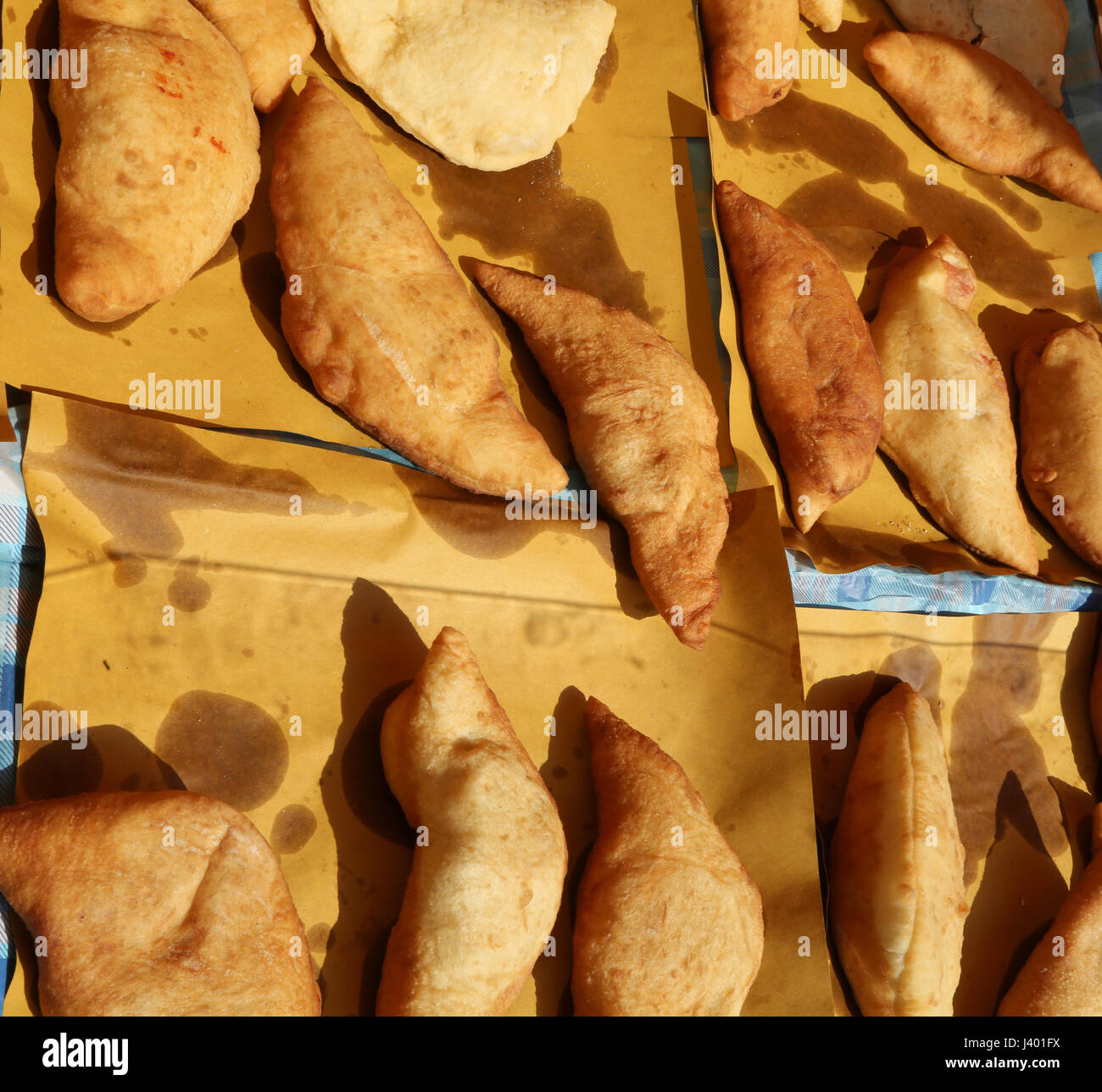 Many italian stuffed fried bread called Panzerotti or Pizza Puff with ...