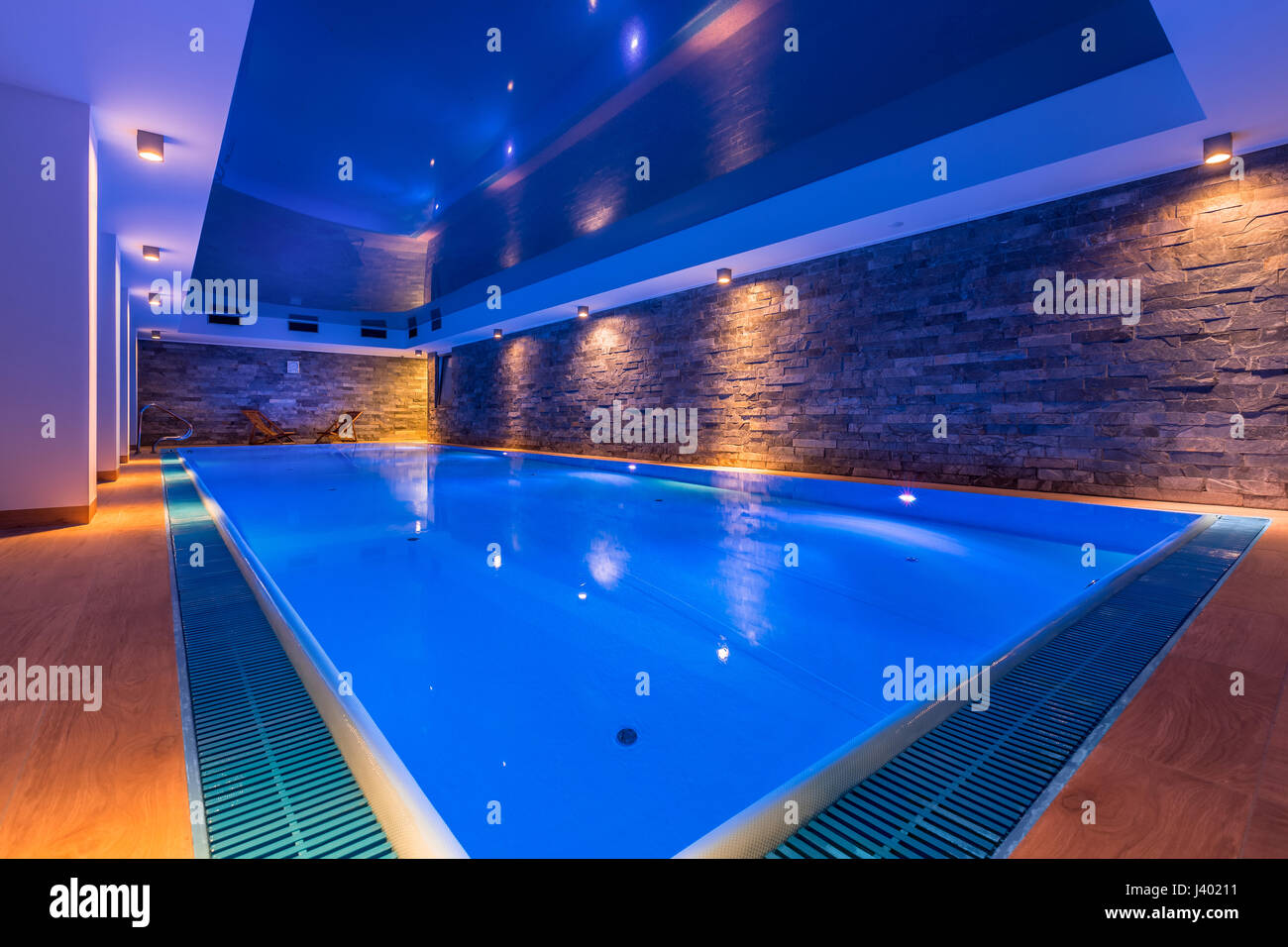 Luxury indoor swimming pool in modern hotel spa Stock Photo - Alamy
