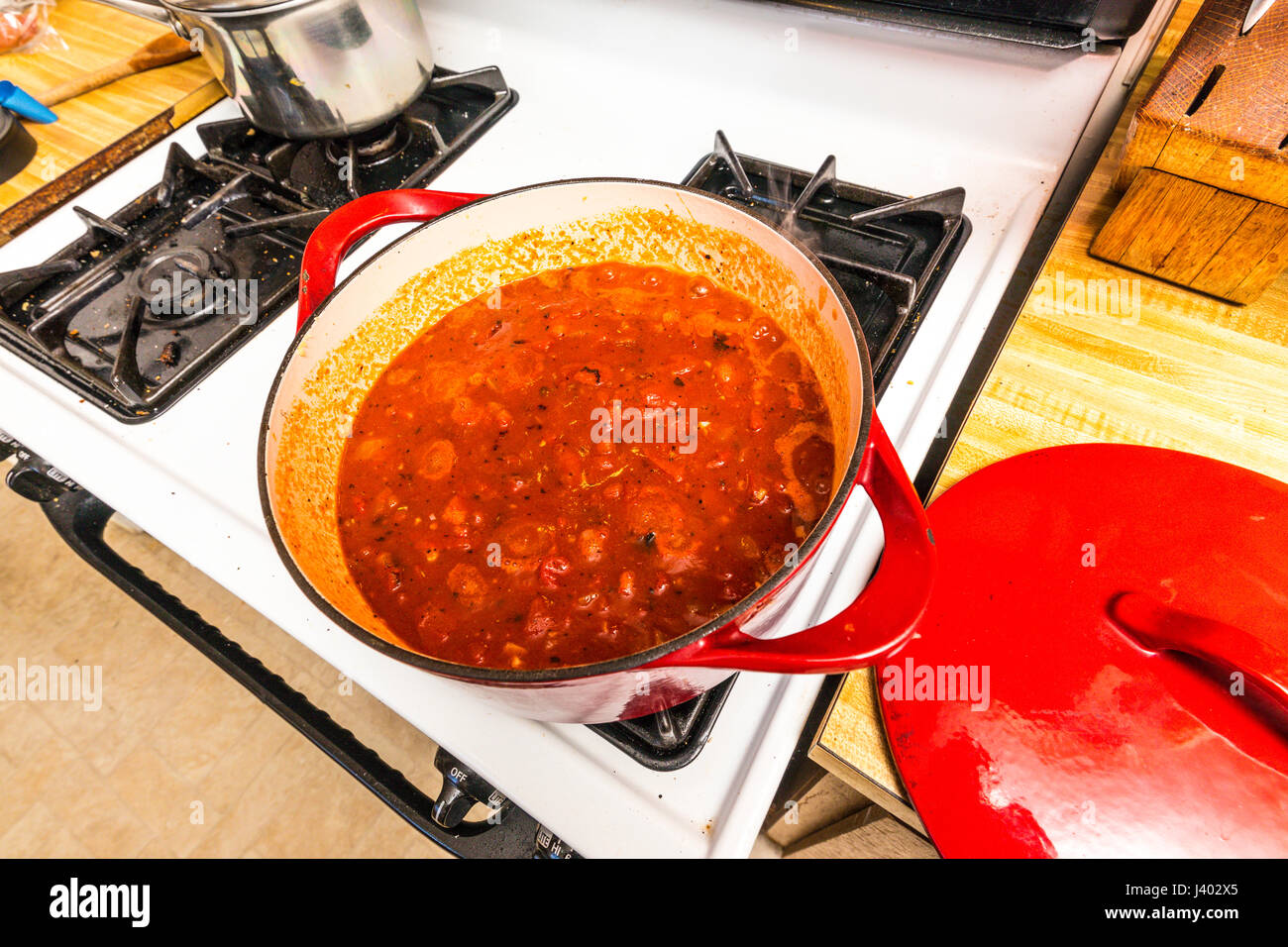 A Marinara Sauce made with fire roasted tomatoes in a cast iron pot on
