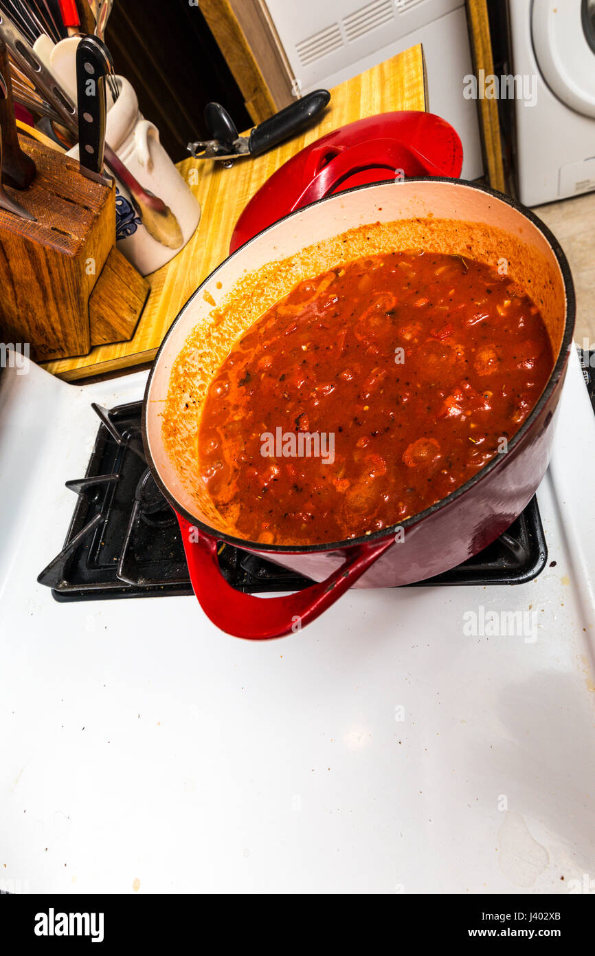 A Marinara Sauce made with fire roasted tomatoes in a cast iron pot on