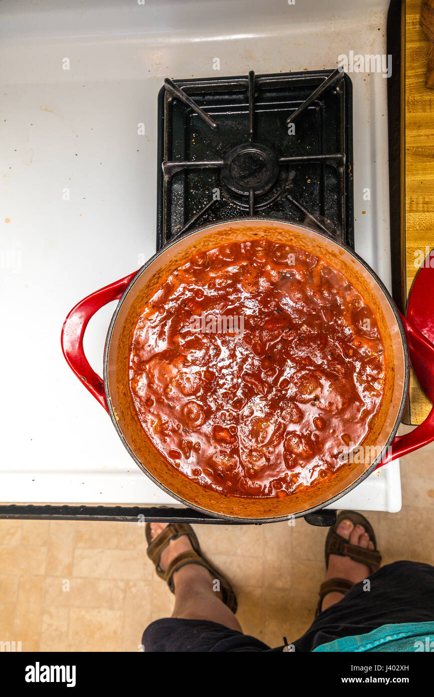 A Marinara Sauce made with fire roasted tomatoes in a cast iron pot on a stove Stock Photo Alamy