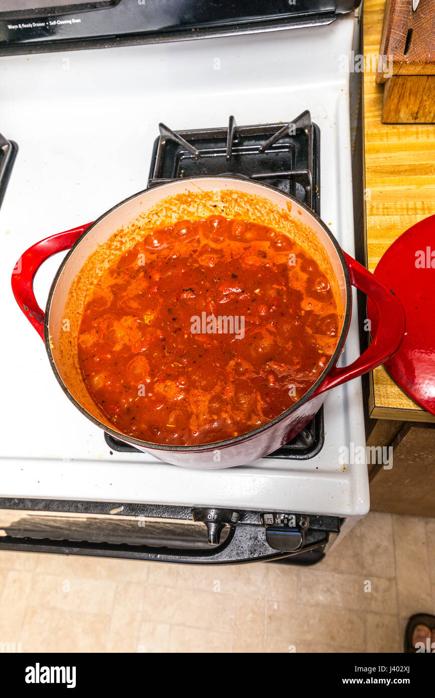 A Marinara Sauce made with fire roasted tomatoes in a cast iron pot on