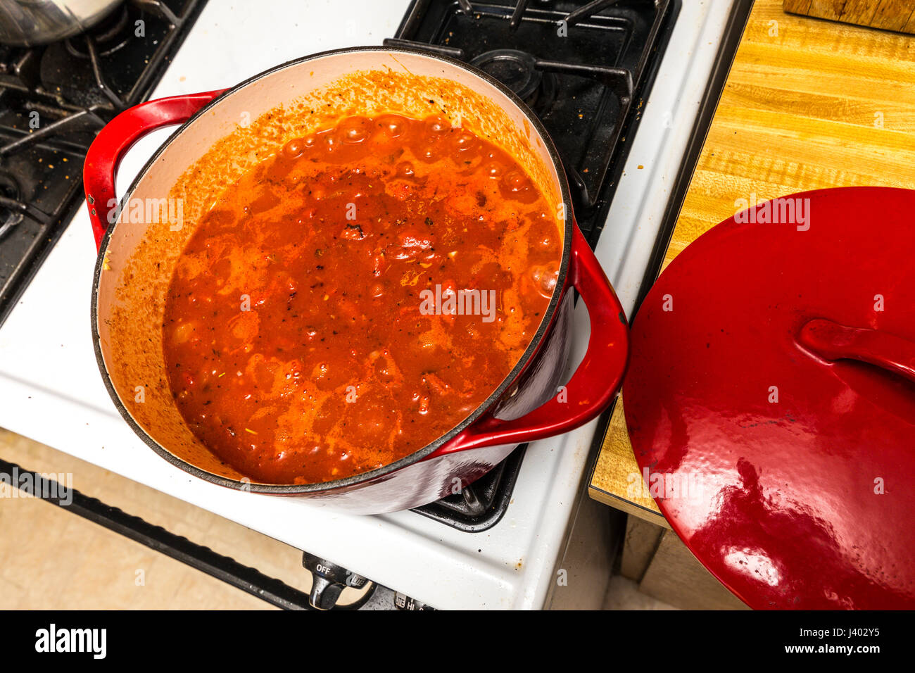 A Marinara Sauce made with fire roasted tomatoes in a cast iron pot on