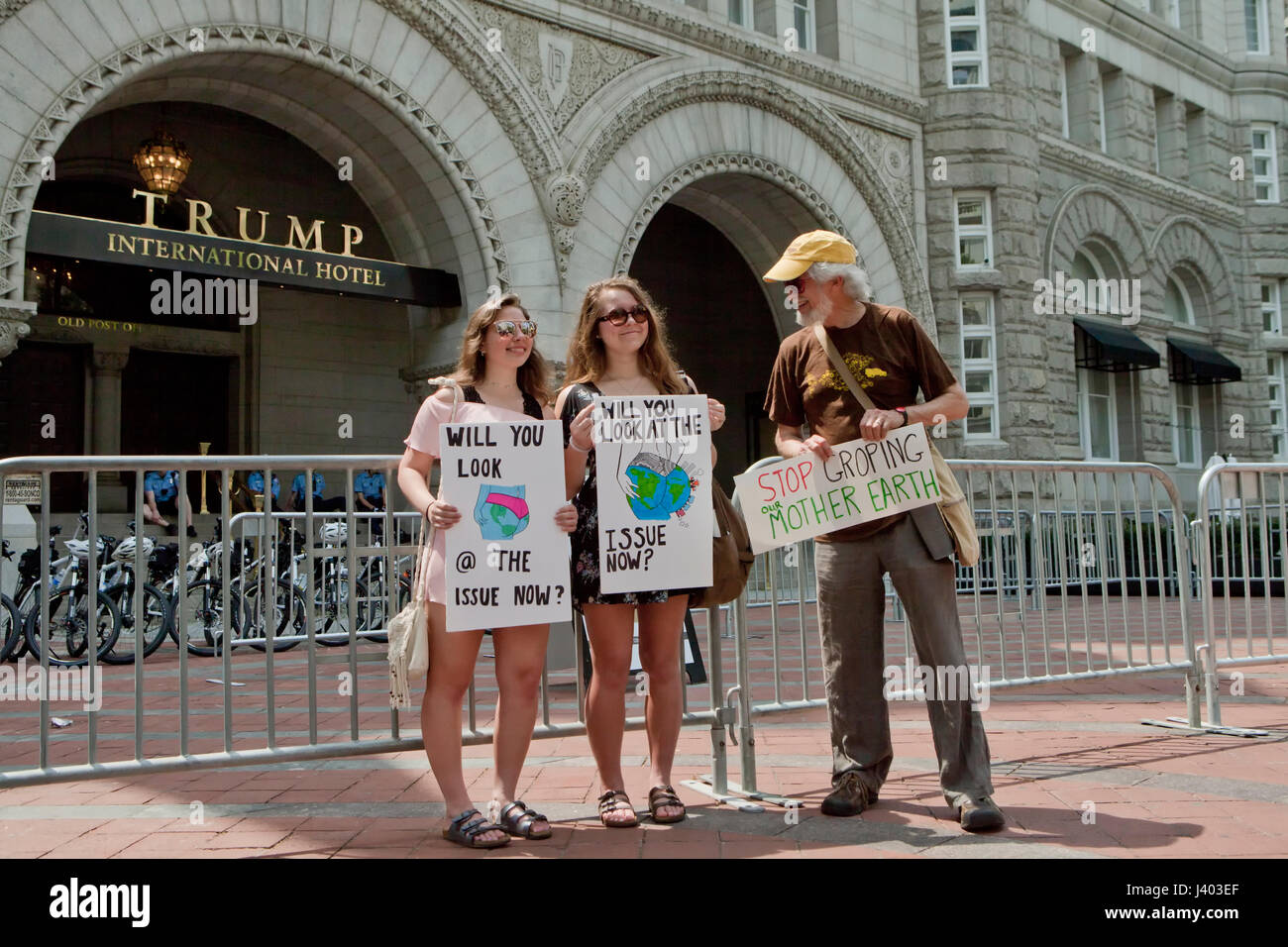 Climate change activists protesting in front of Trump International Hotel - Washington, DC USA Stock Photo