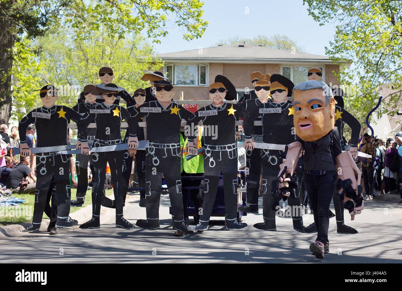 A group protesting Morton county, North Dakota law enforcement at the Mayday parade in Minneapolis, Minnesota, USA. Stock Photo