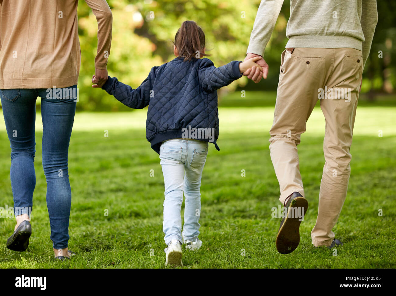 happy family walking in summer park Stock Photo - Alamy