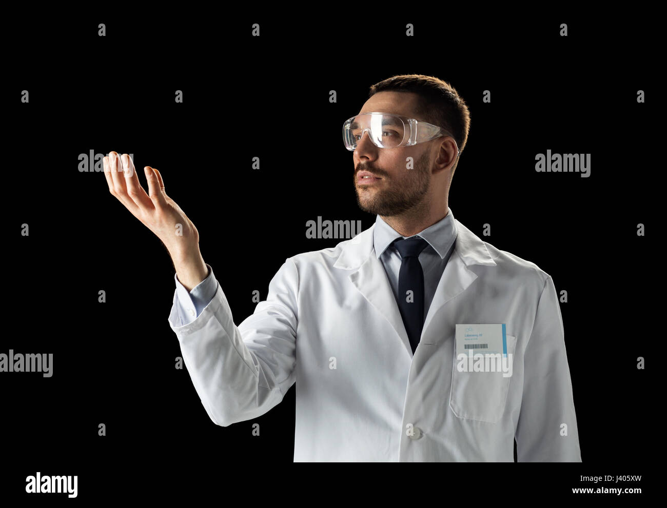 doctor or scientist in lab coat and safety glasses Stock Photo Alamy