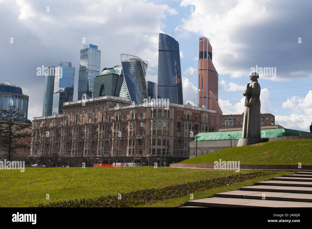 Skyscrapers of Moscow City and the woman soldier of the Hero City Obelisk, a monument to Lenin and to the men and the women who died in World War II Stock Photo