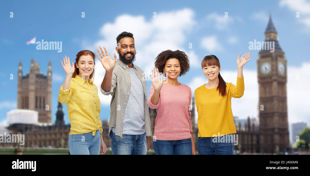 international group of happy people waving hands Stock Photo - Alamy