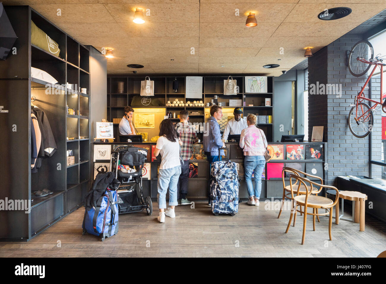 Lobby with reception desk. Ace Hotel Shoreditch, London, United Kingdom. Architect: EPR Architects Limited, 2016. Stock Photo