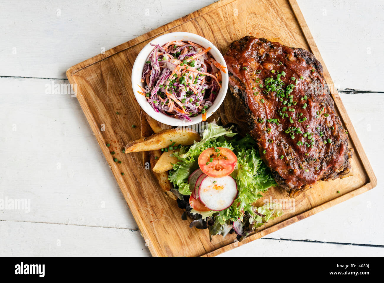 pork bbq ribs with  coleslaw and salad set meal Stock Photo