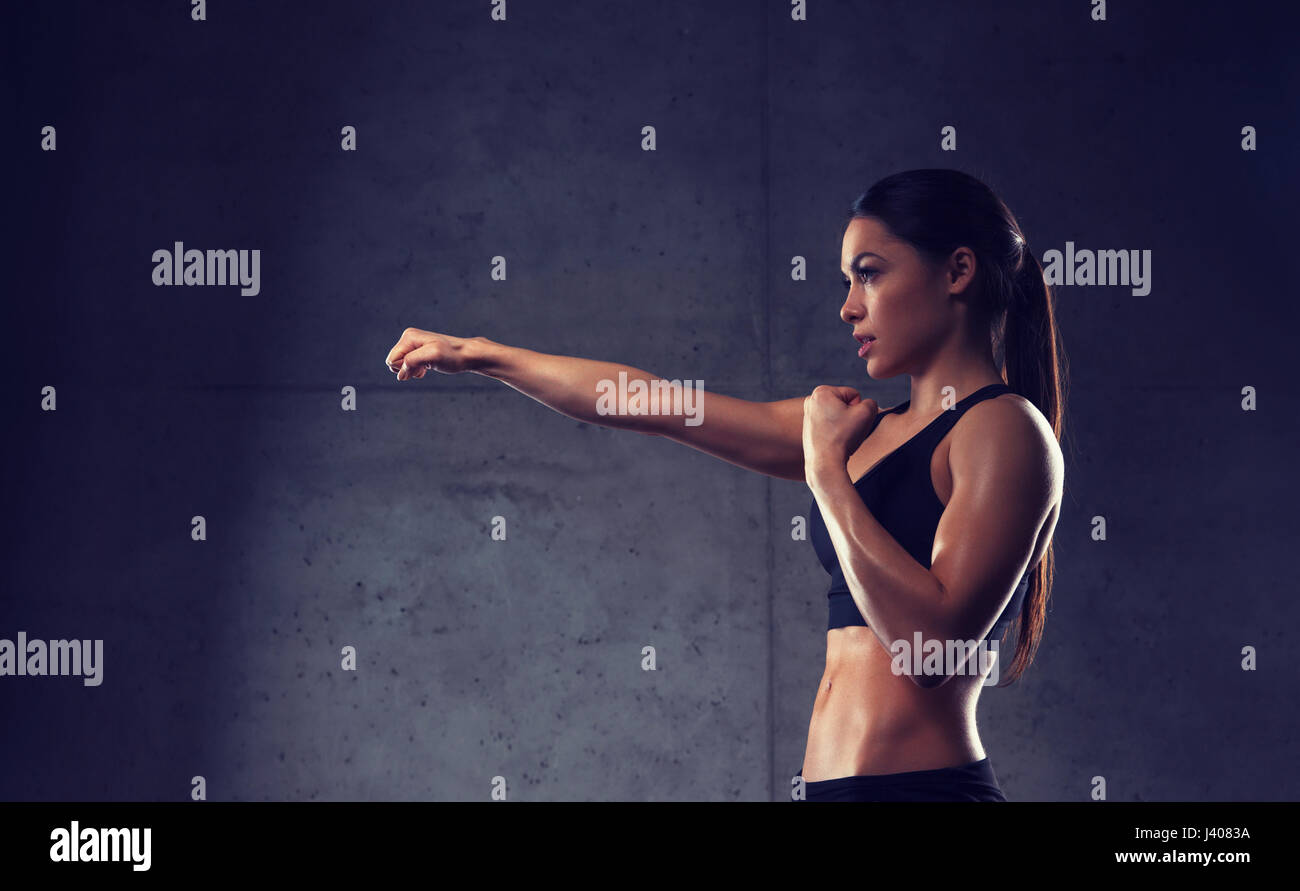 woman boxing in gym Stock Photo
