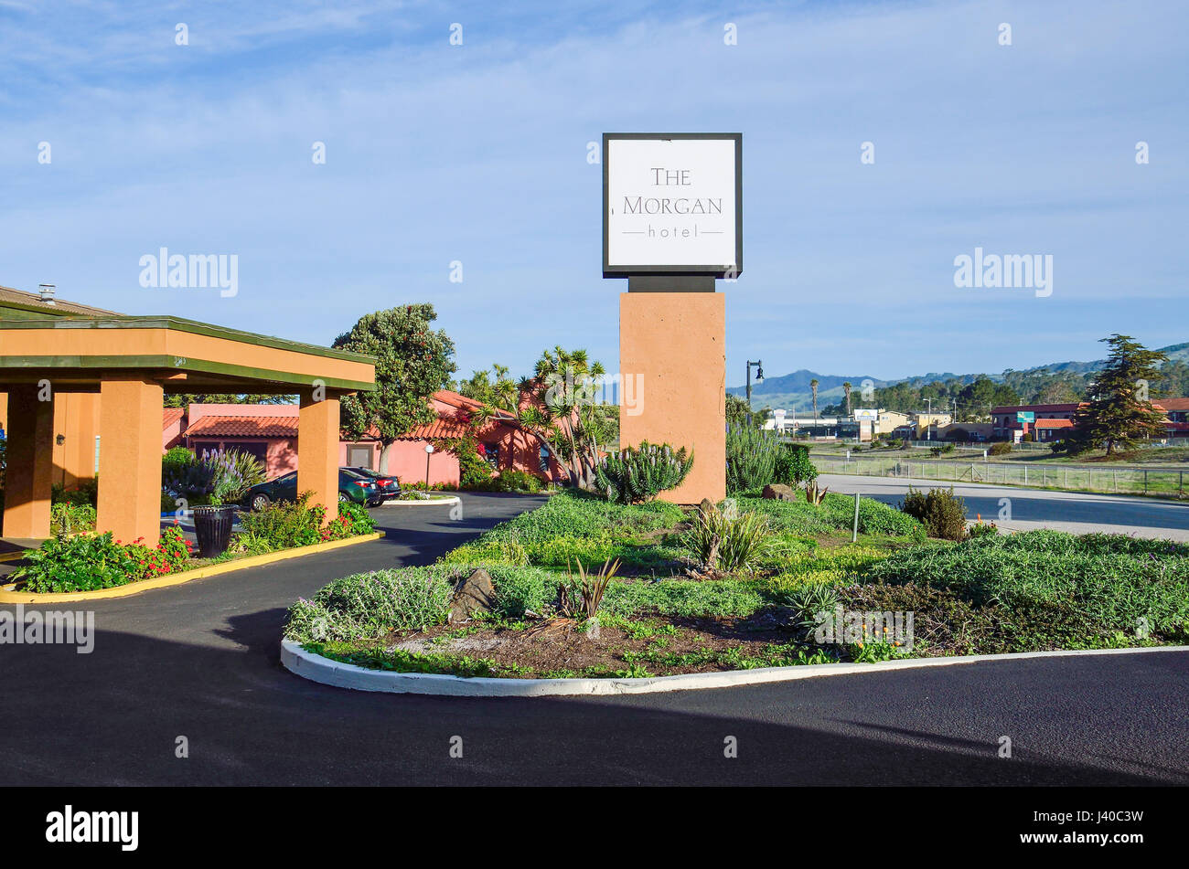 San Simeon, USA - March 11, 2014: The Morgan Hotel by Hearst Castle sign with road in Big Sur California Stock Photo