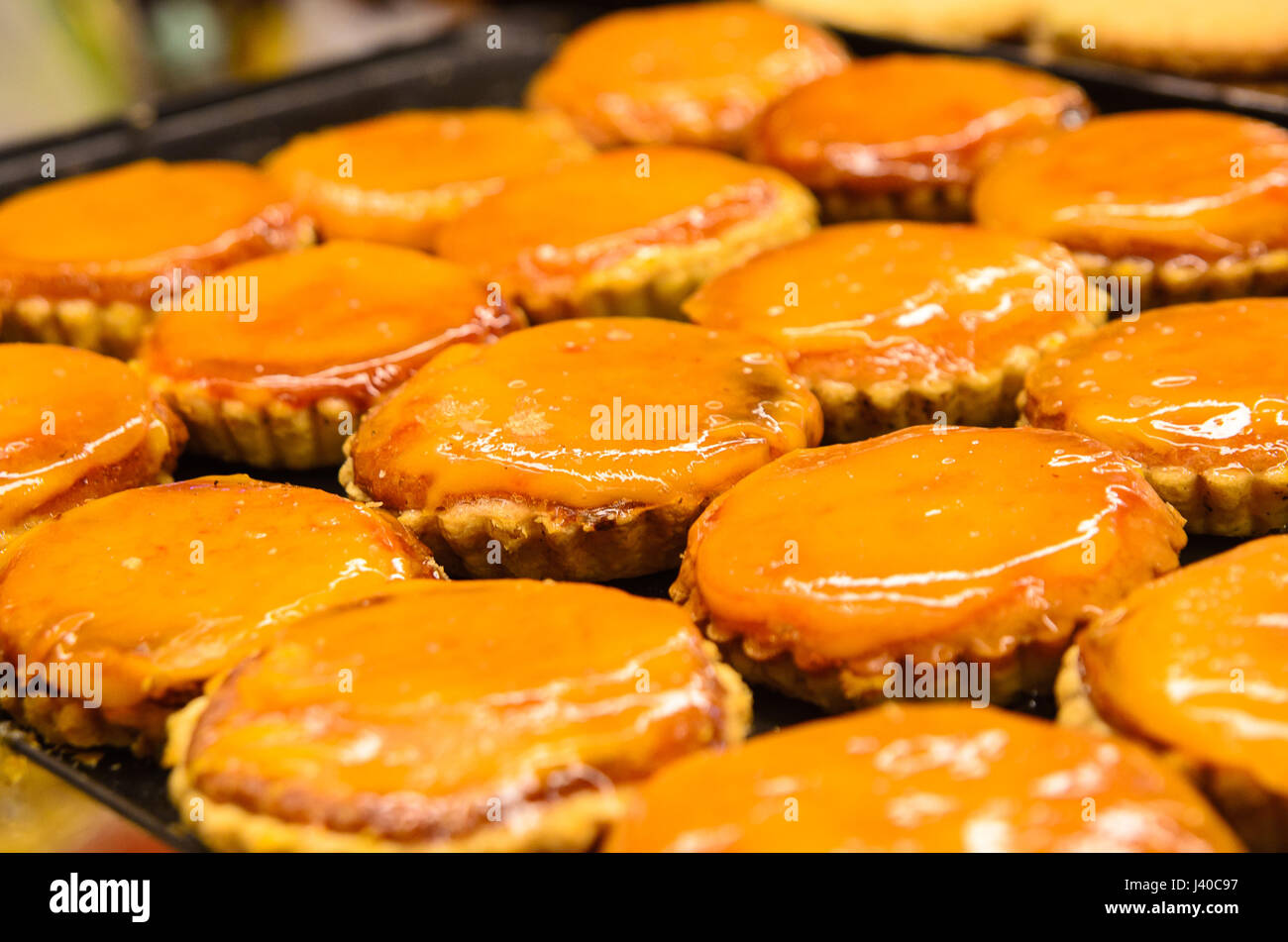 delicious egg tart on tray, spanish typical sweets Stock Photo