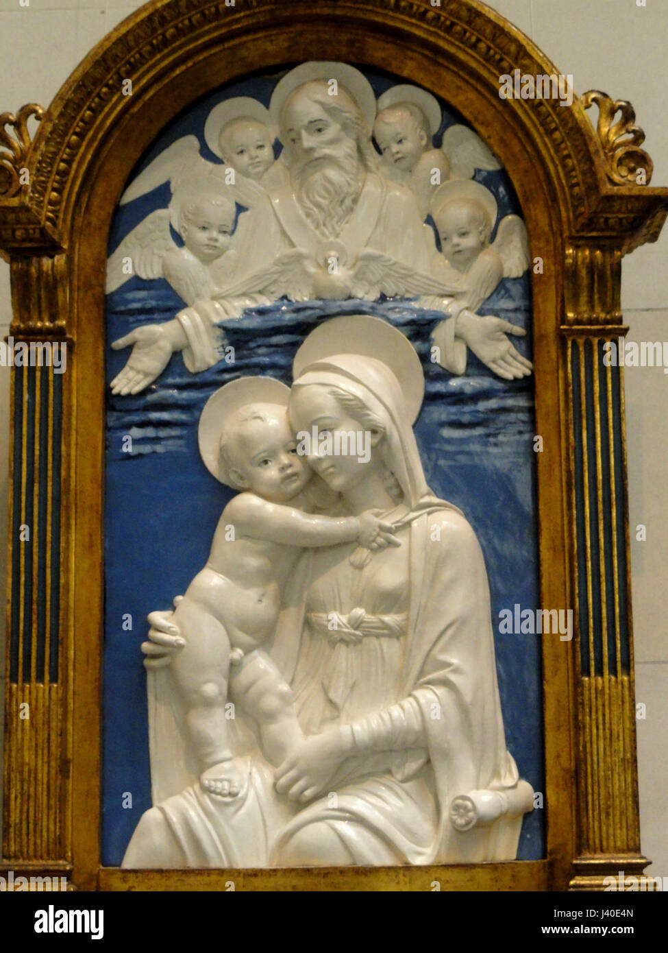 Madonna and Child with God the Father and Cherubim, workshop of Andrea della Robbia, c. 1480, glazed terra cotta   National Gallery of Art, Washington   DSC08822 Stock Photo