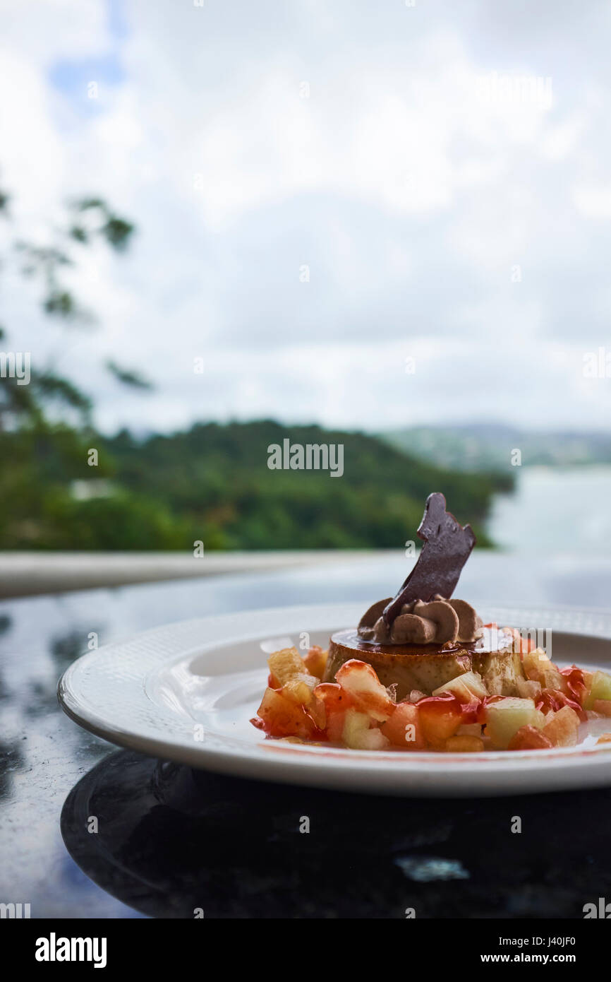 Chocolate flan and tropical fruit dessert, Saint Lucia, Caribbean Stock