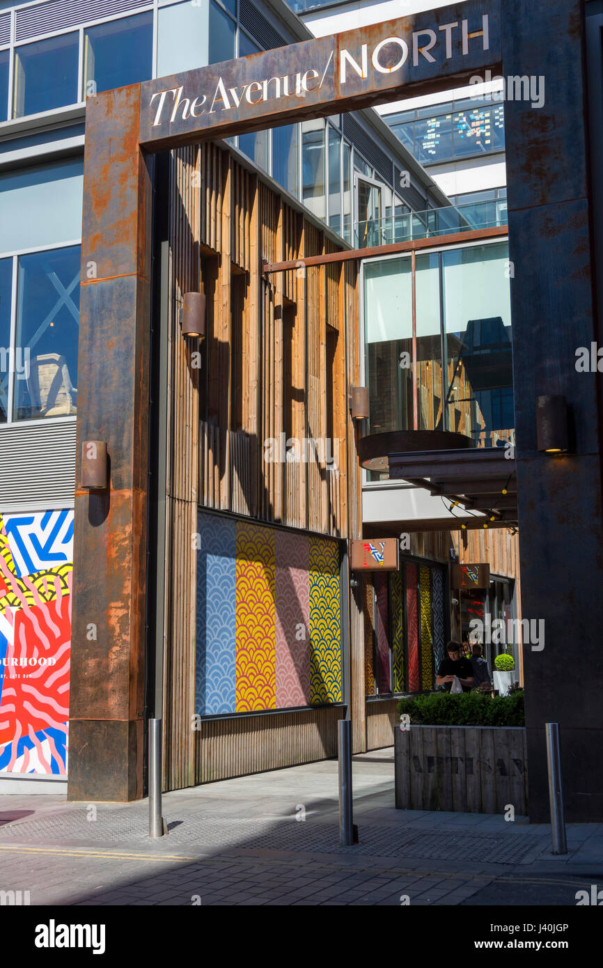 Weathering steel and timber structure at the entrance to 'The Avenue North', Spinningfields, Manchester, England, UK Stock Photo