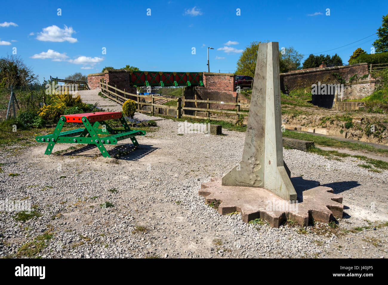 Sculptured milestone at the Meccano Bridge picnic area, Manchester Bolton & Bury Canal, Little Lever, Bolton, Manchester, England, UK Stock Photo