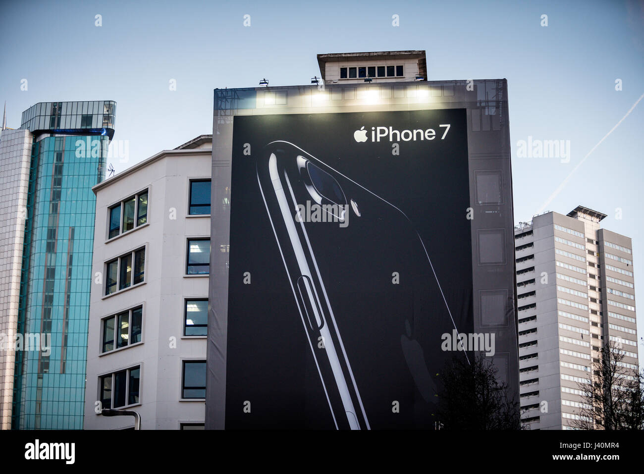Apple iPhone 7 billboard advertisement and buildings in city centre, UK Stock Photo
