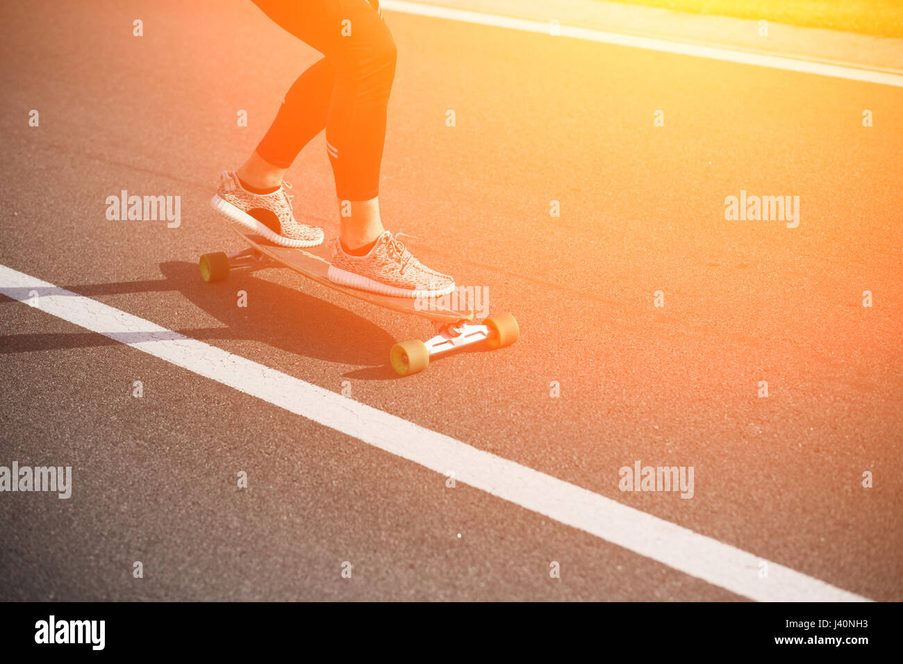 Man on skateboard or longboard Stock Photo