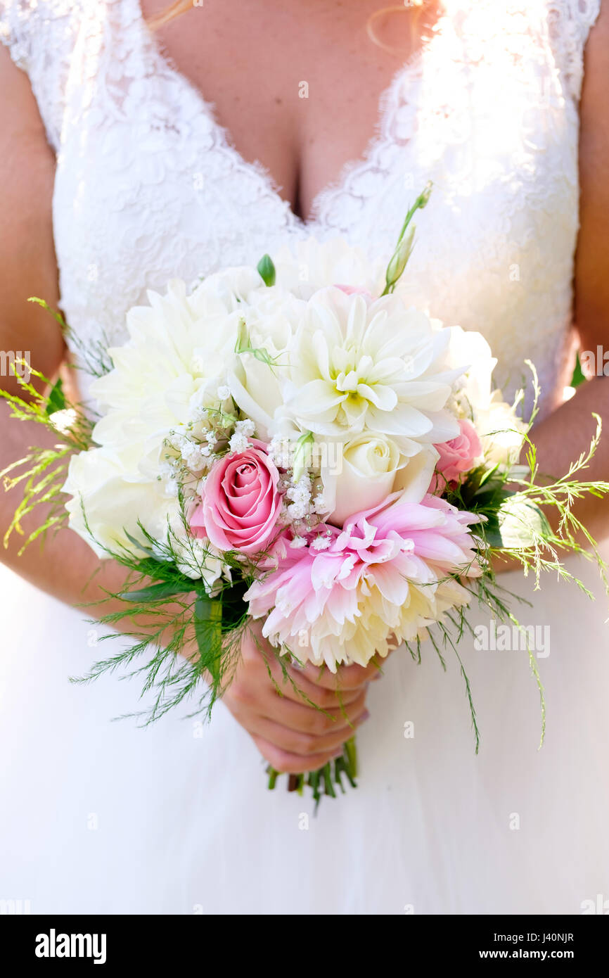 Bride Holding Wedding Bouquet Stock Photo Alamy