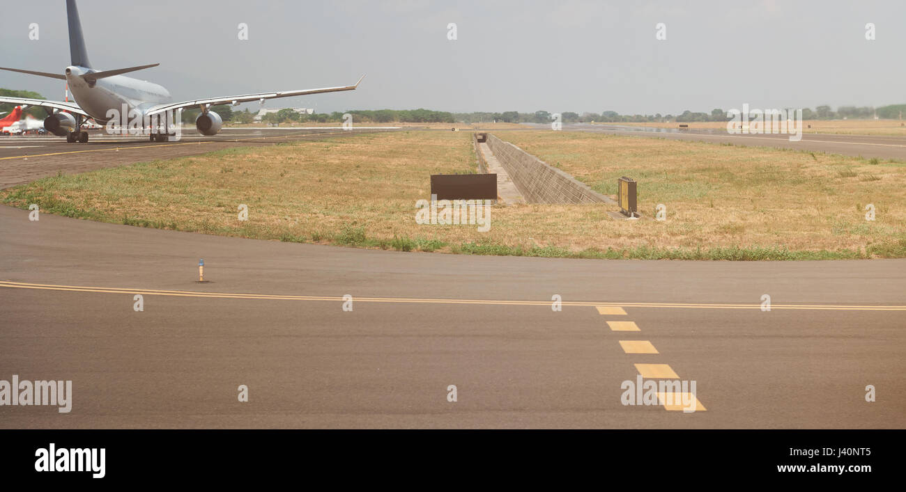 Airplane in airport runway. Air plane ready to take off Stock Photo