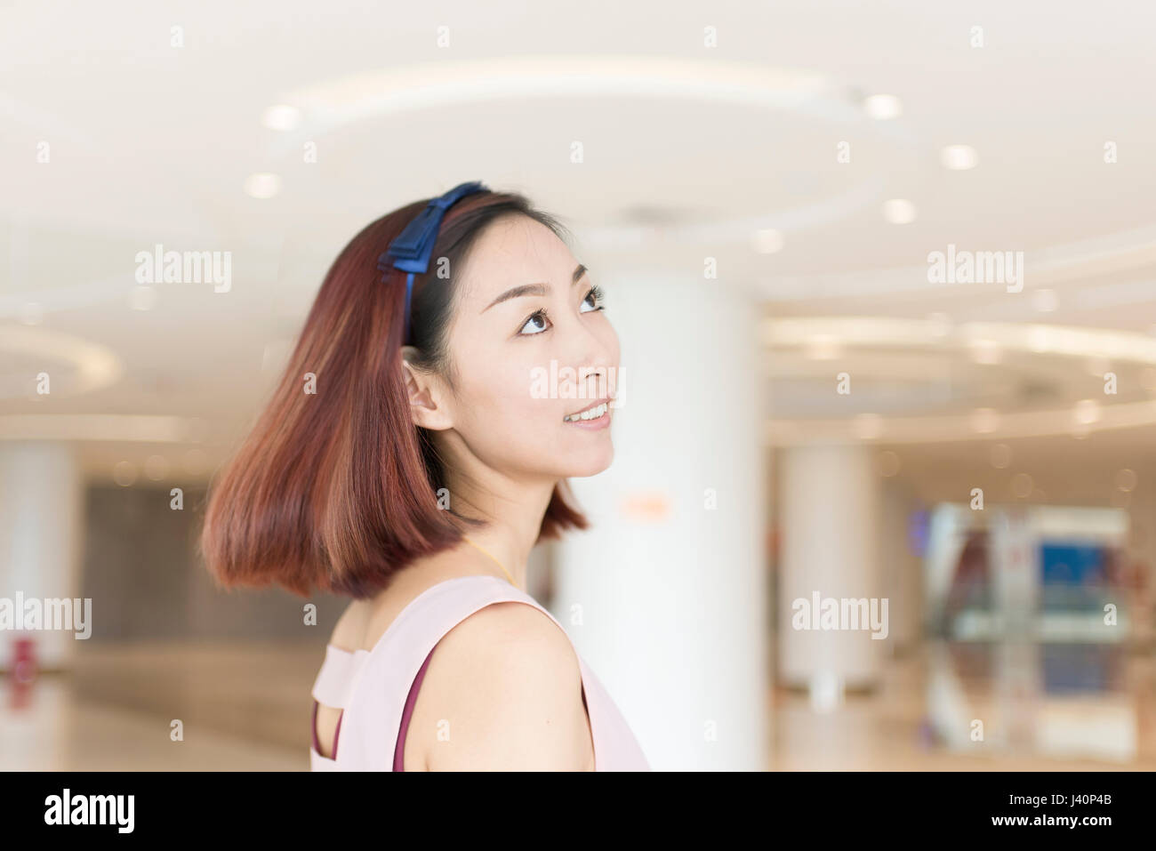 Beautiful girl in the shopping center Stock Photo - Alamy