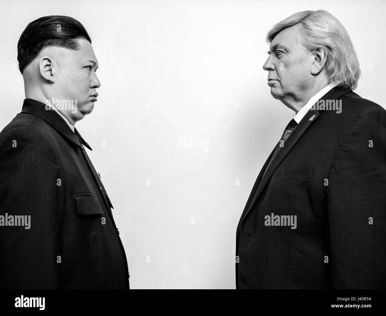 President Donald Trump lookalike and Supreme Leader of North Korea Kim Jong-Un lookalike portrait shoot.  An unlikely love story of two dictators. Stock Photo