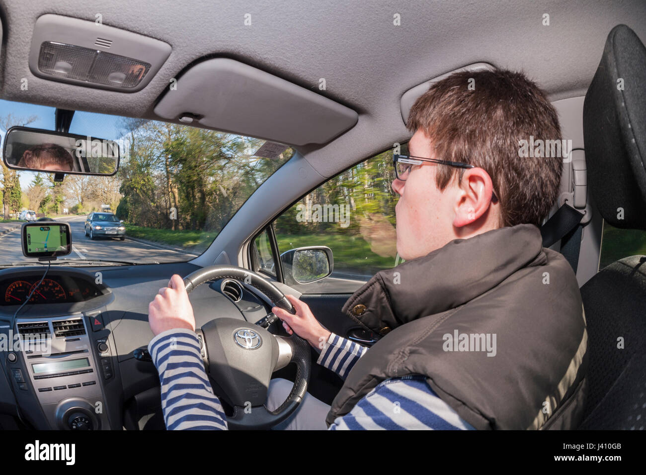 A Model Released 17 year old boy learning to drive in the Uk Stock Photo