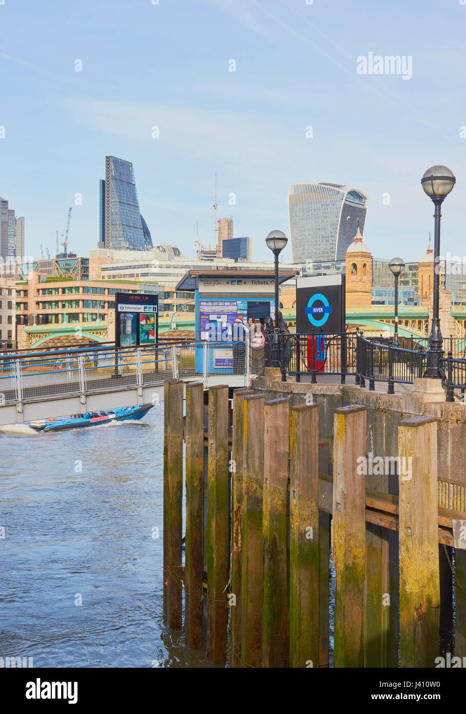 Riverboat city cruise stop near Southwark Bridge, London, England Stock Photo