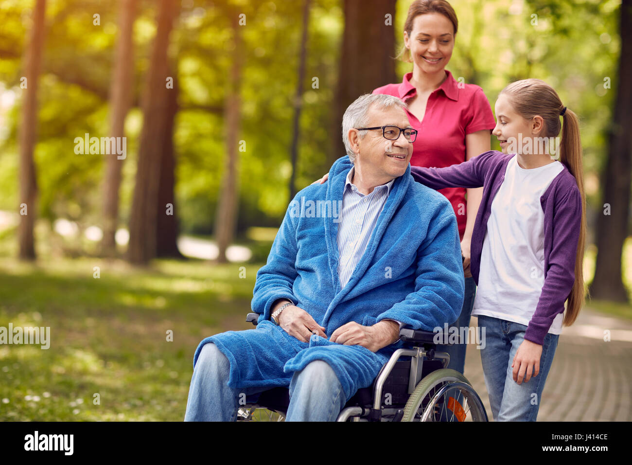Happy wheelchair people hi-res stock photography and images - Alamy