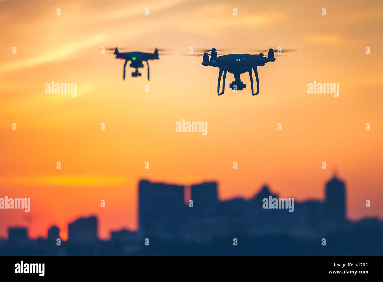 Two modern Remote Control Air Drones Fly with action cameras Stock ...