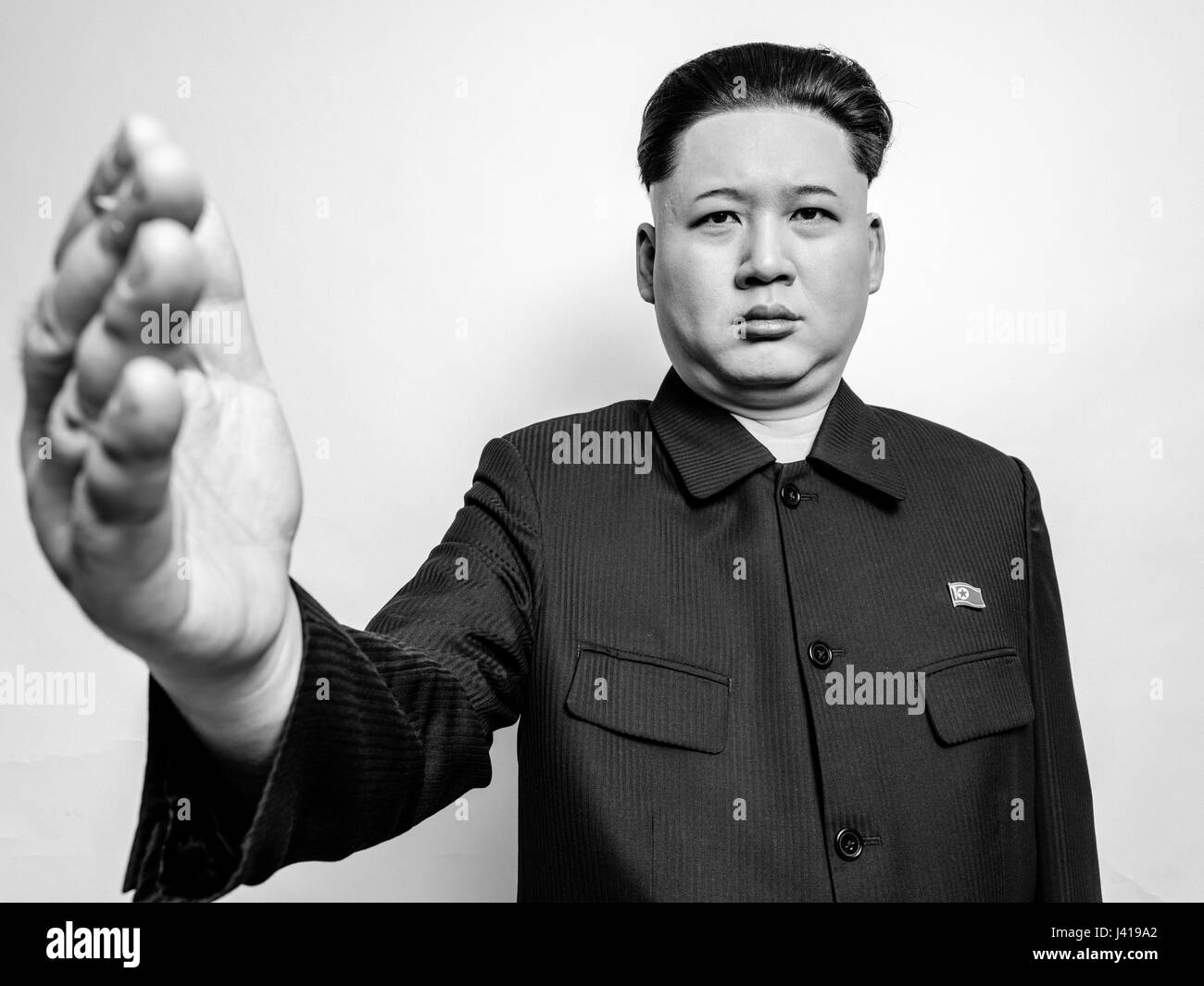 Supreme Leader of North Korea Kim Jong Un lookalike during his visit to Hong Kong.  Kim Jong-Un posed for studio portraits and met Obama and Trump. Stock Photo