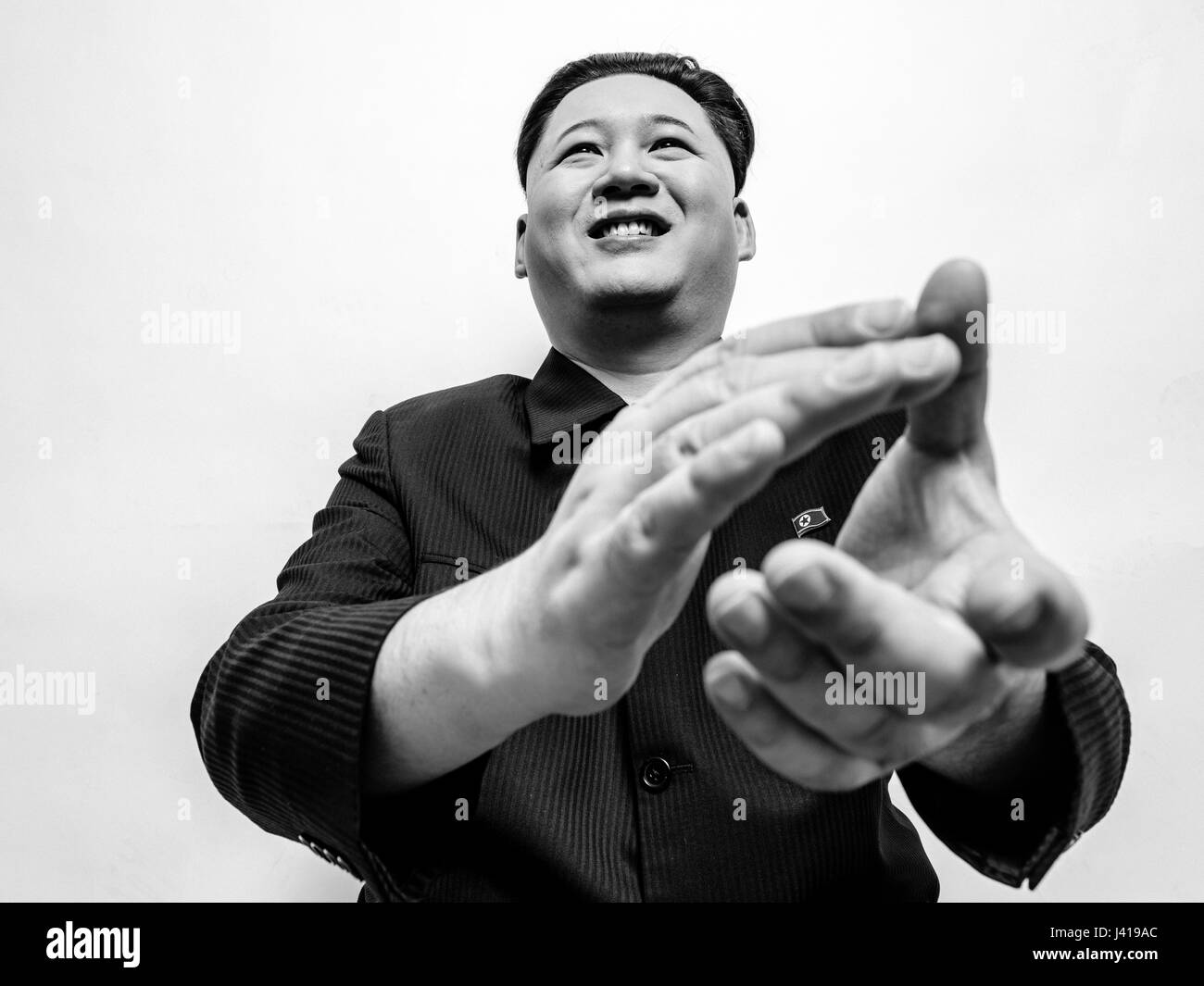 Supreme Leader of North Korea Kim Jong Un lookalike during his visit to Hong Kong.  Kim Jong-Un posed for studio portraits and met Obama and Trump. Stock Photo