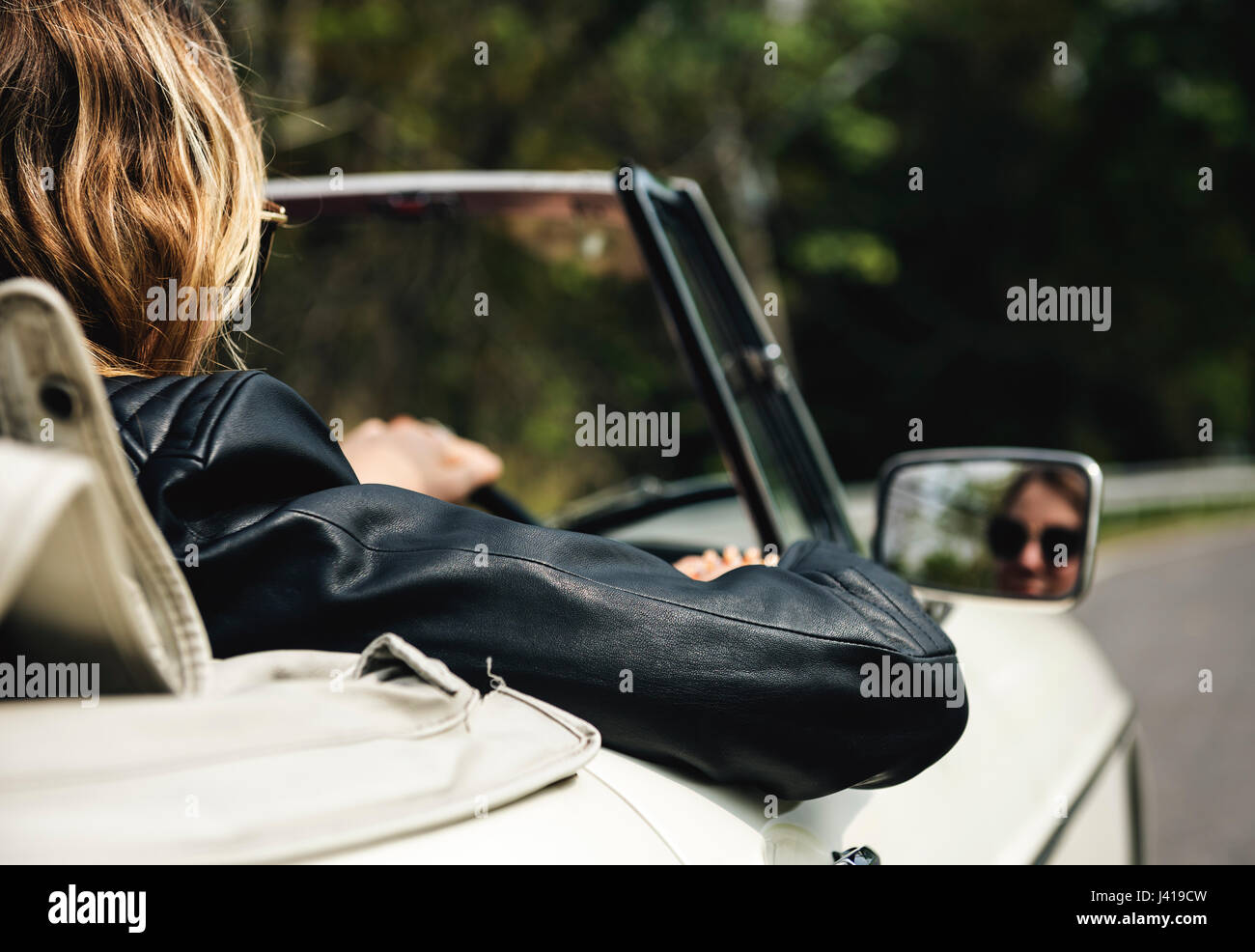 Woman Driving a Car with Windows Down Stock Photo Alamy