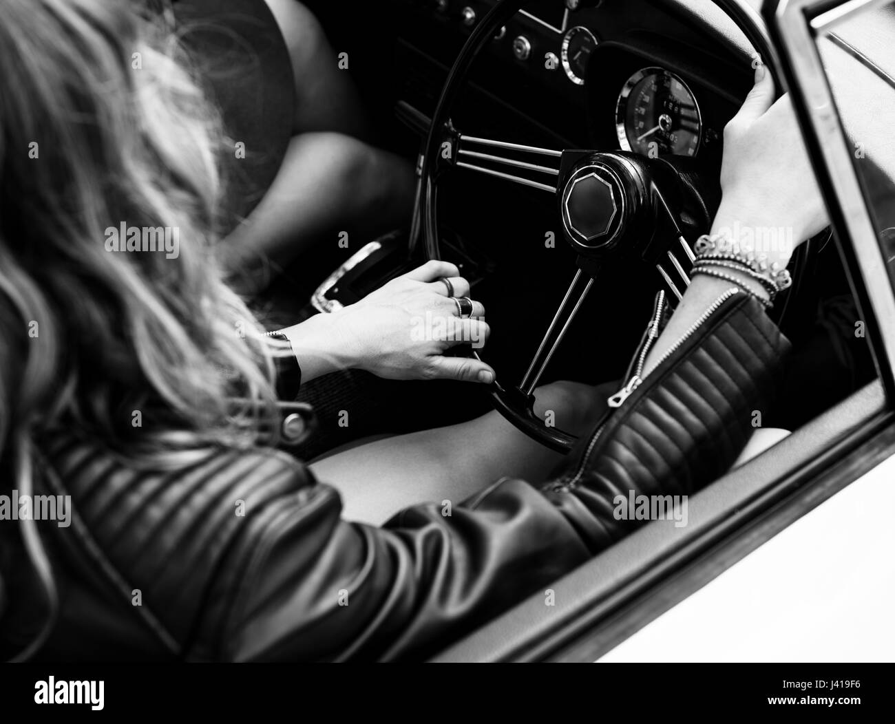 Woman Driving a Car with Windows Down Stock Photo Alamy
