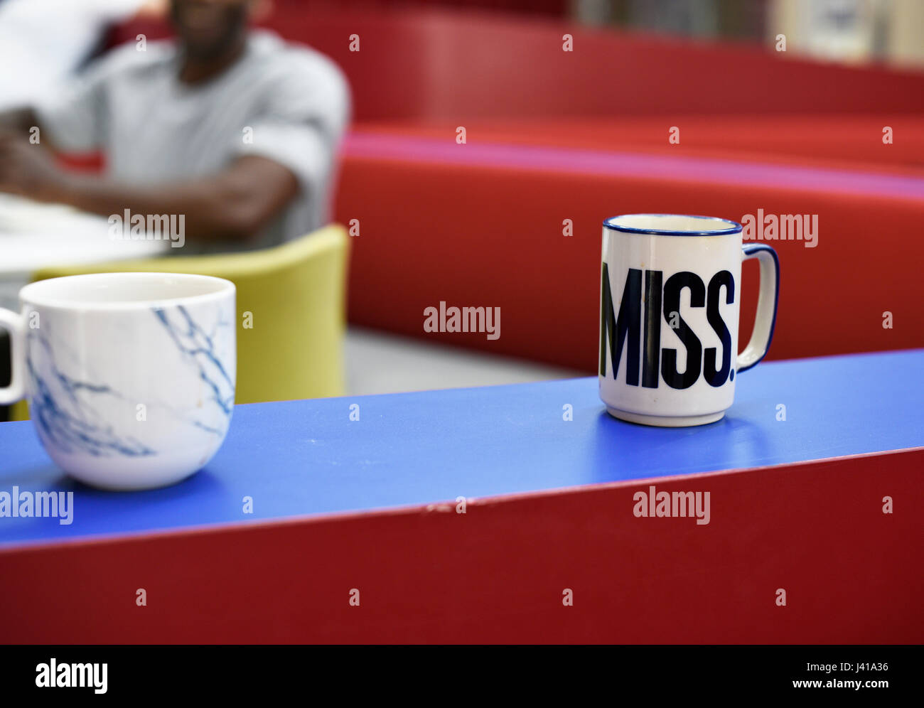 Coffee Cups on Table in Pantry Room Stock Photo