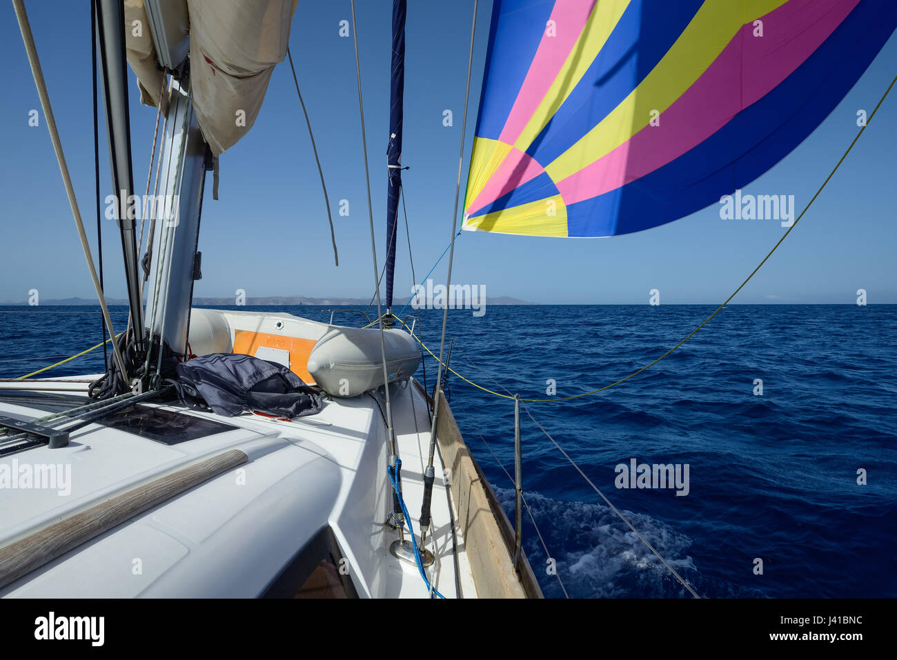 Sailing yacht with Gennaker sail between the Greek Islands, Aegean