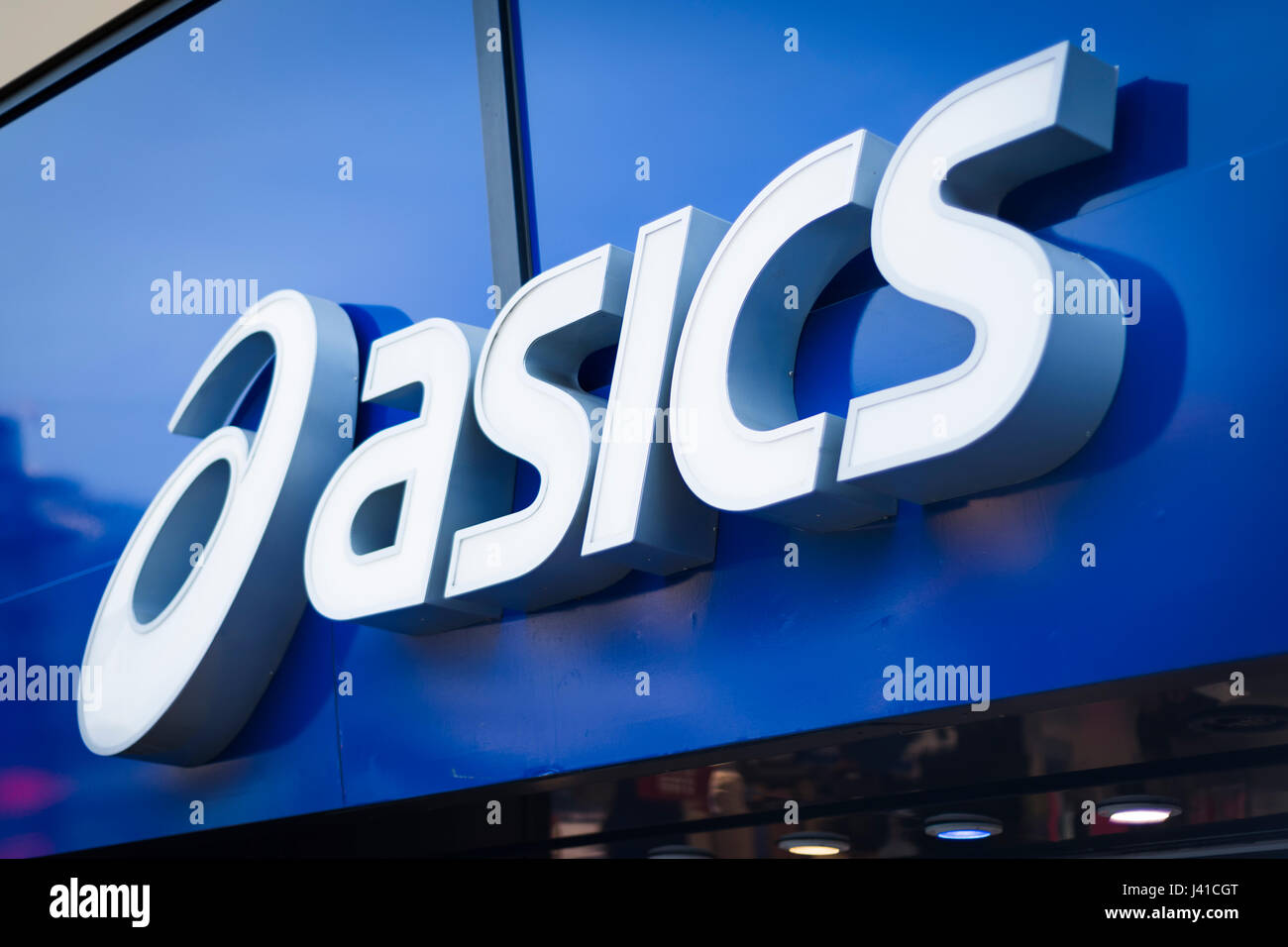 Asics logo sign on building Stock Photo - Alamy