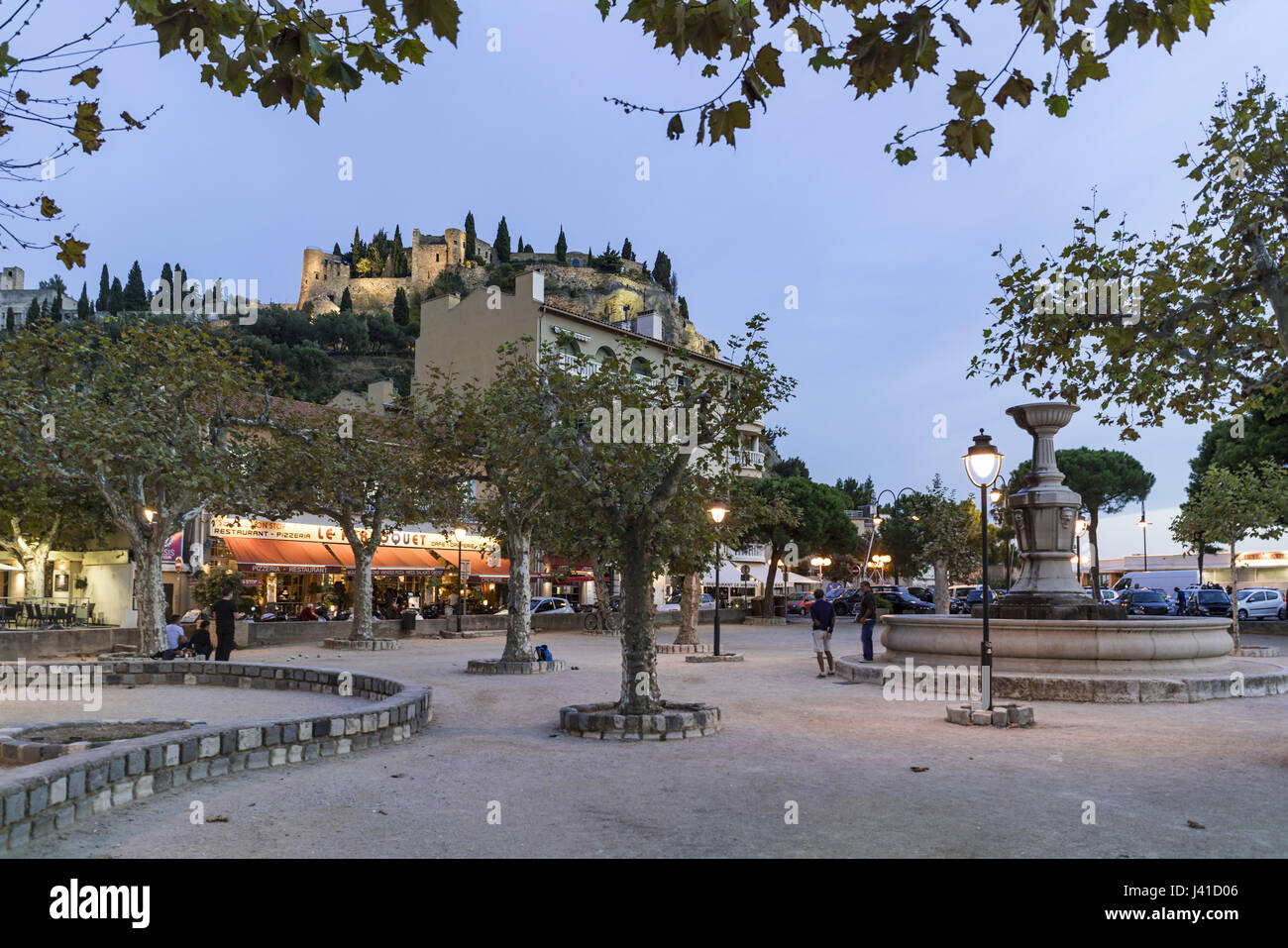 Boules in a square near the harbour, Fortress in the background, Cassis, Cote d Azur, France Stock Photo