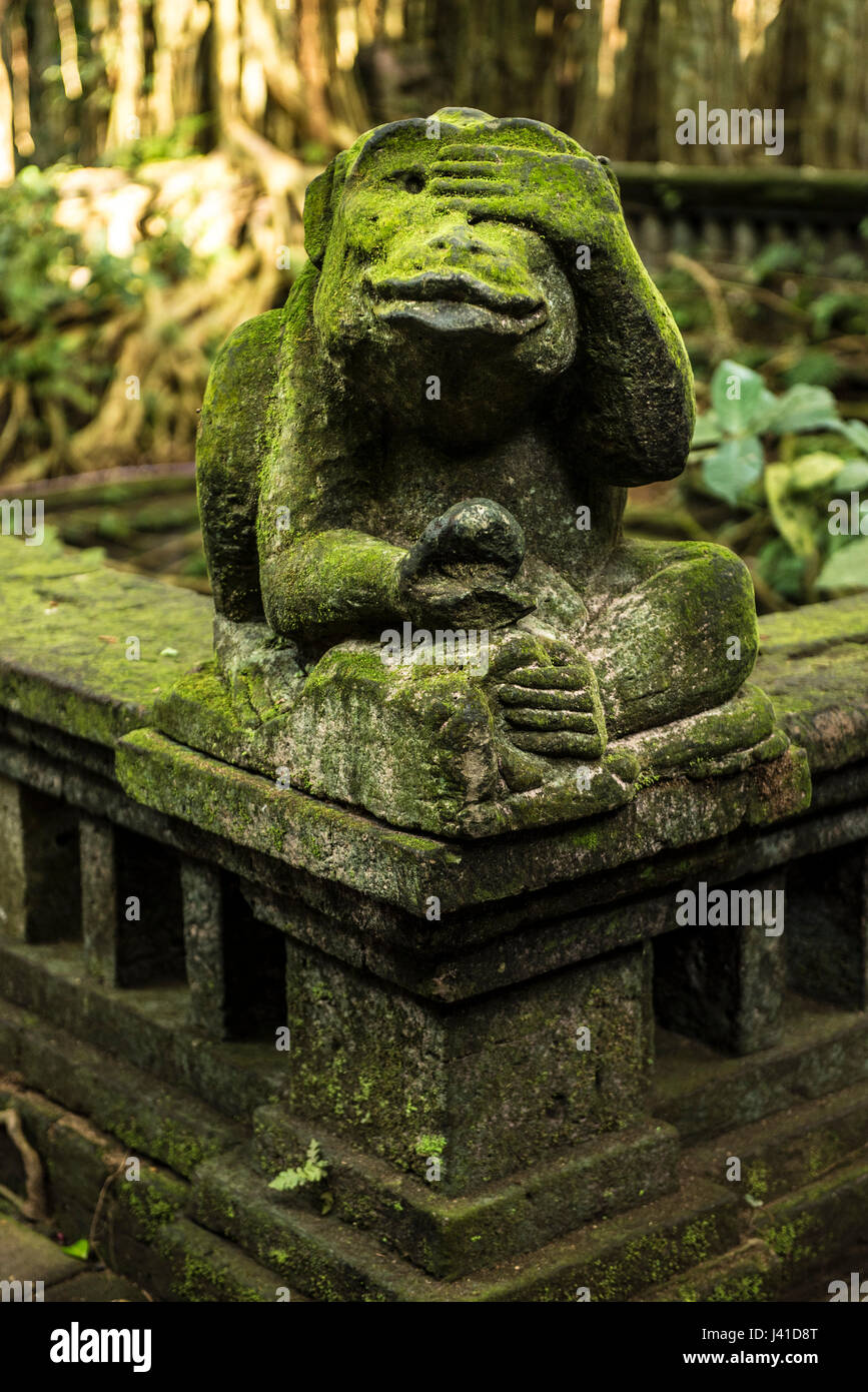 Balinese temple entrance with monkey statues in the temple town of Ubud, Bali, Indonesia Stock Photo